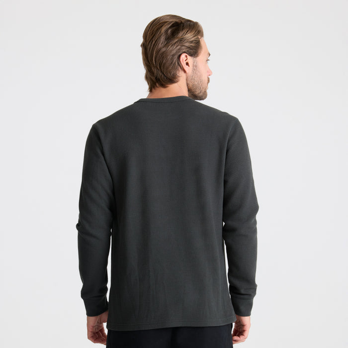 Versatile long-sleeved active shirt by Roark, perfect for outdoor adventures and travel, featuring functional gadgets for the modern explorer.