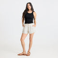Active Bermuda-style shorts featured in a dynamic setting, emphasizing the versatility and comfort ideal for adventure and travel.
